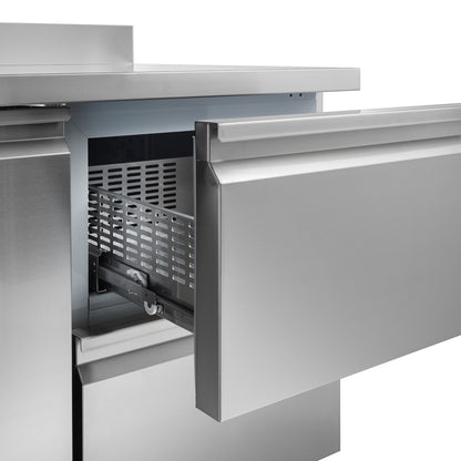 RVS dieptekoelwerkbank met vier deurs GN lades en opstaand werkbladrand, open lade zichtbaar.